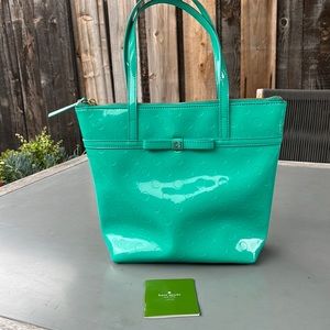 KATE SPADE hand bag. Teal exterior and gold interior!